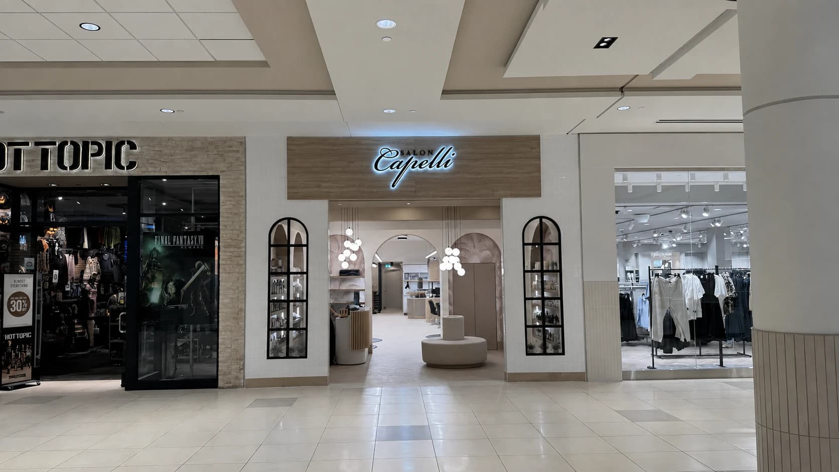 Salon Capelli storefront and illuminated sign inside Bayshore Shopping Centre